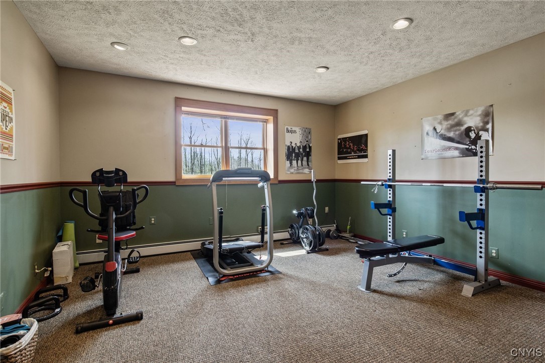 545 County Rte 54 Schroeppel, NY 13132 - Photo 35 of 50 basement large gym room (Possible 6th bedroom)