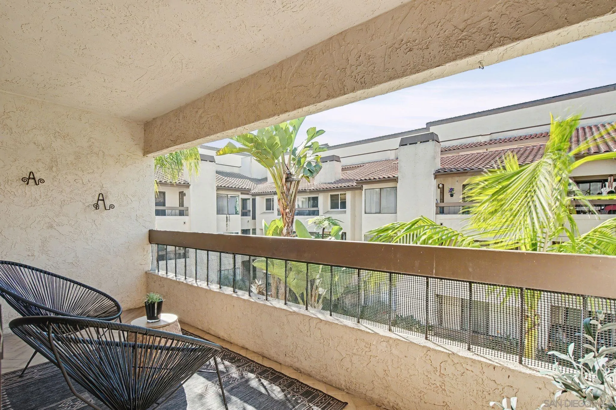 6757 Friars Road, Unit 21 San Diego, CA 92108 - Photo 18 of 40 a view of a balcony with chair