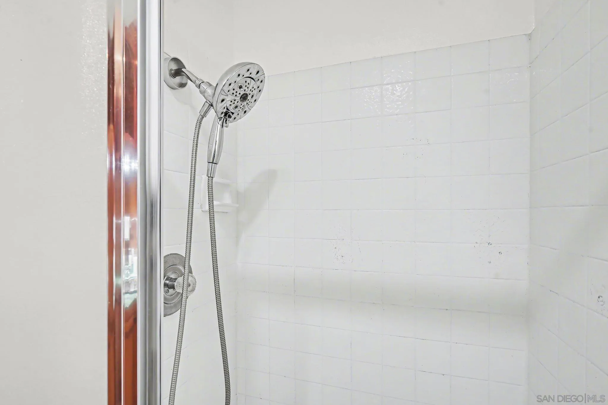 6757 Friars Road, Unit 21 San Diego, CA 92108 - Photo 29 of 40 a bathroom with a shower