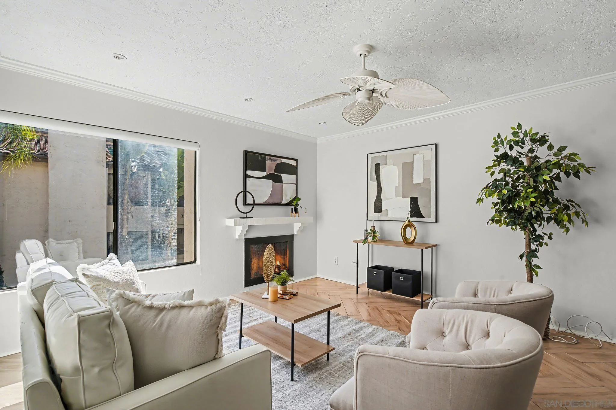 6757 Friars Road, Unit 21 San Diego, CA 92108 - Photo 3 of 40 a living room with furniture and a fireplace