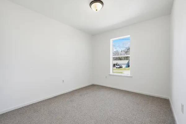 an empty room with a window