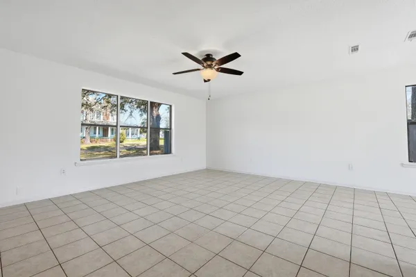 a view of an empty room and window