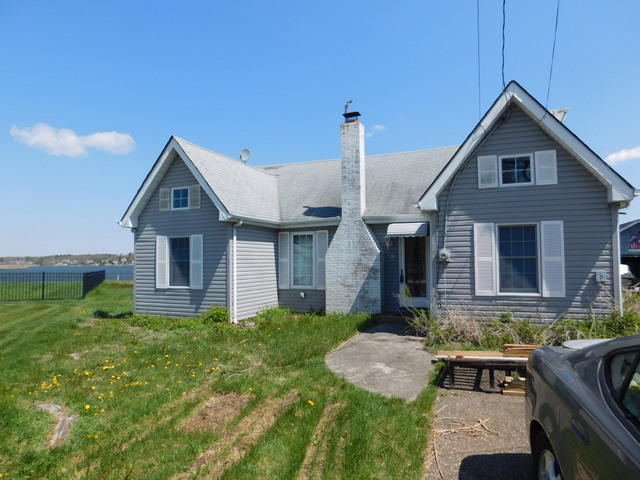 29 Metedeconk Road Brick, NJ 08723 - Photo 2 of 14 a front view of house with a garden