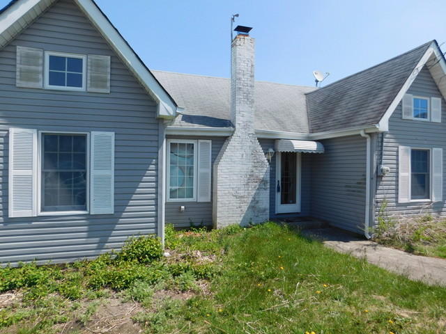 29 Metedeconk Road Brick, NJ 08723 - Photo 3 of 14 front view of a house with a yard