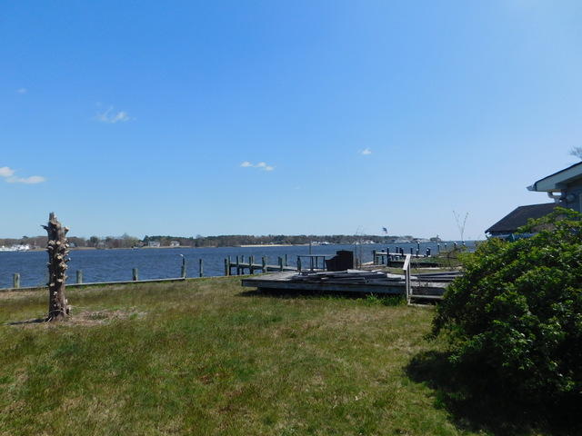 29 Metedeconk Road Brick, NJ 08723 - Photo 5 of 14 a view of a lake with houses