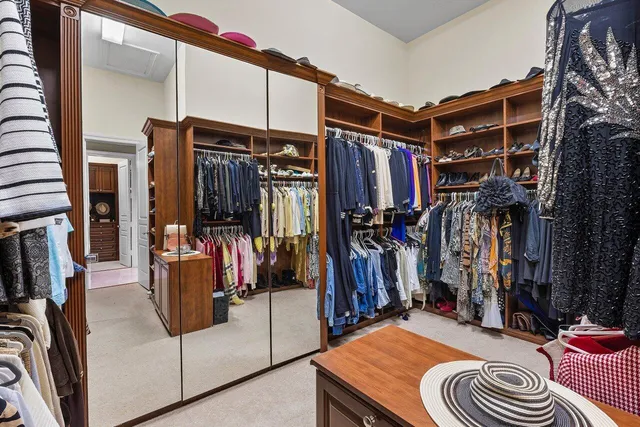 a view of a house with garden and patio