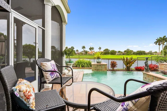 a view of a living room and dining room