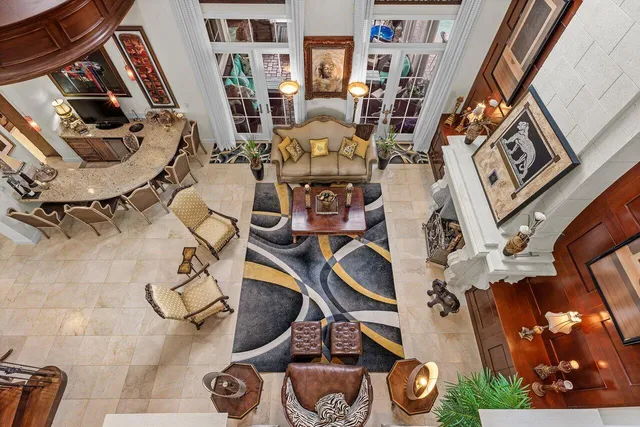 a view of an entryway with wooden floor and windows