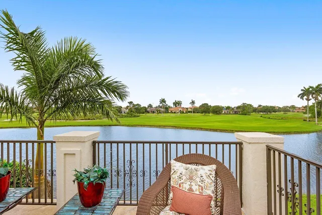 an aerial view of a house with yard
