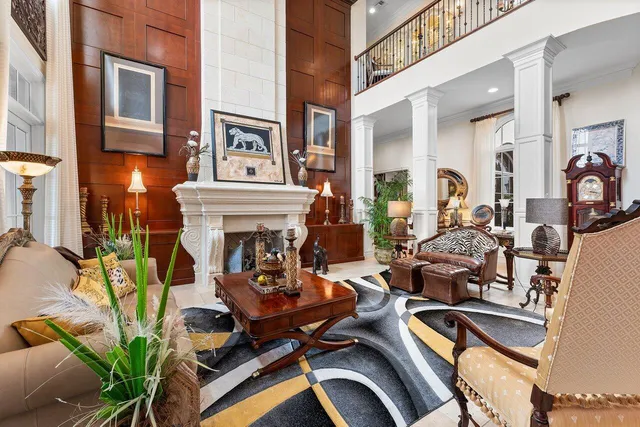 a view of a livingroom with furniture and a fireplace
