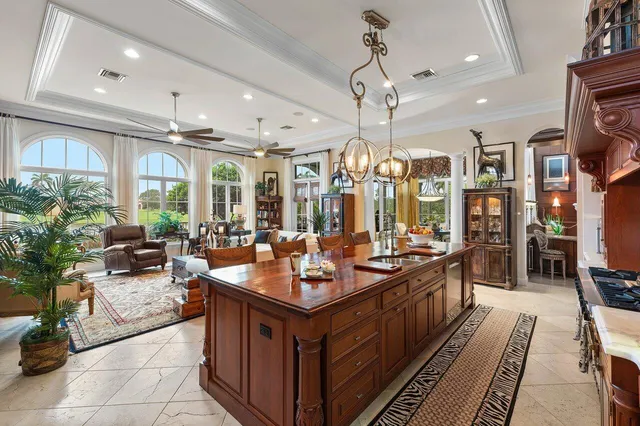 a kitchen island with granite countertop lots of counter top space