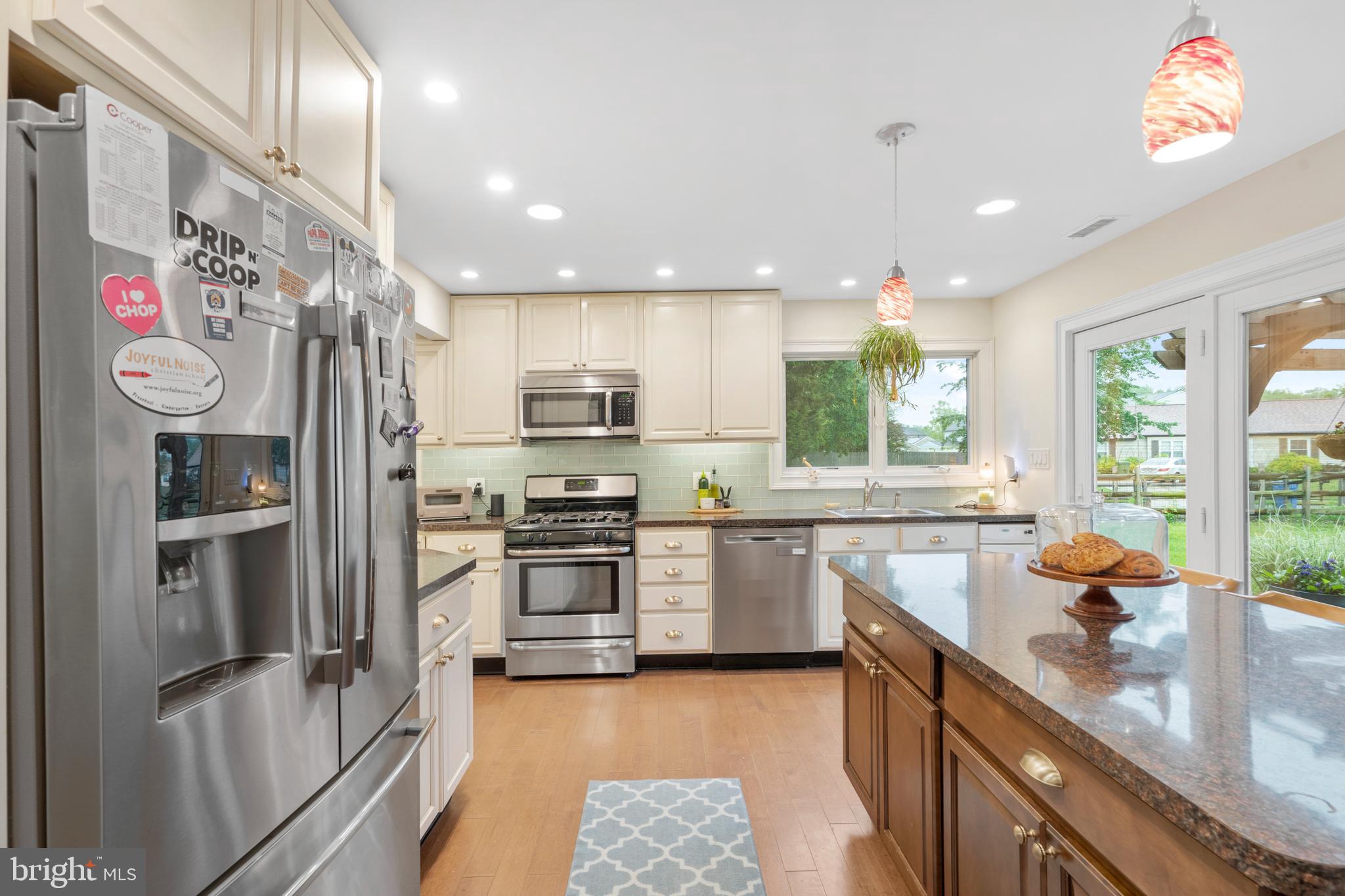 29 Concord Road Marlton, NJ 08053 - Photo 20 of 49 a kitchen with stainless steel appliances granite countertop a sink stove and refrigerator