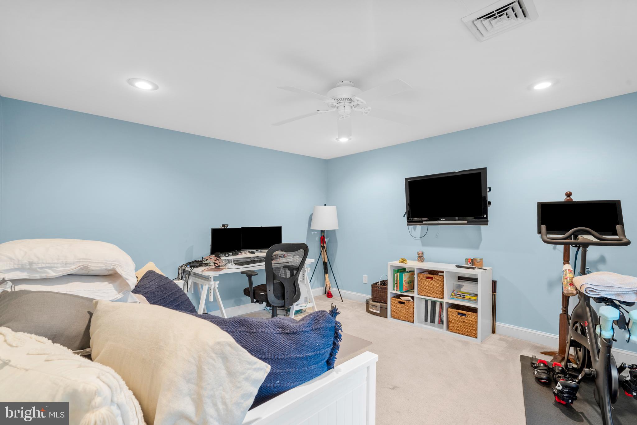 29 Concord Road Marlton, NJ 08053 - Photo 35 of 49 a living room with furniture and a flat screen tv
