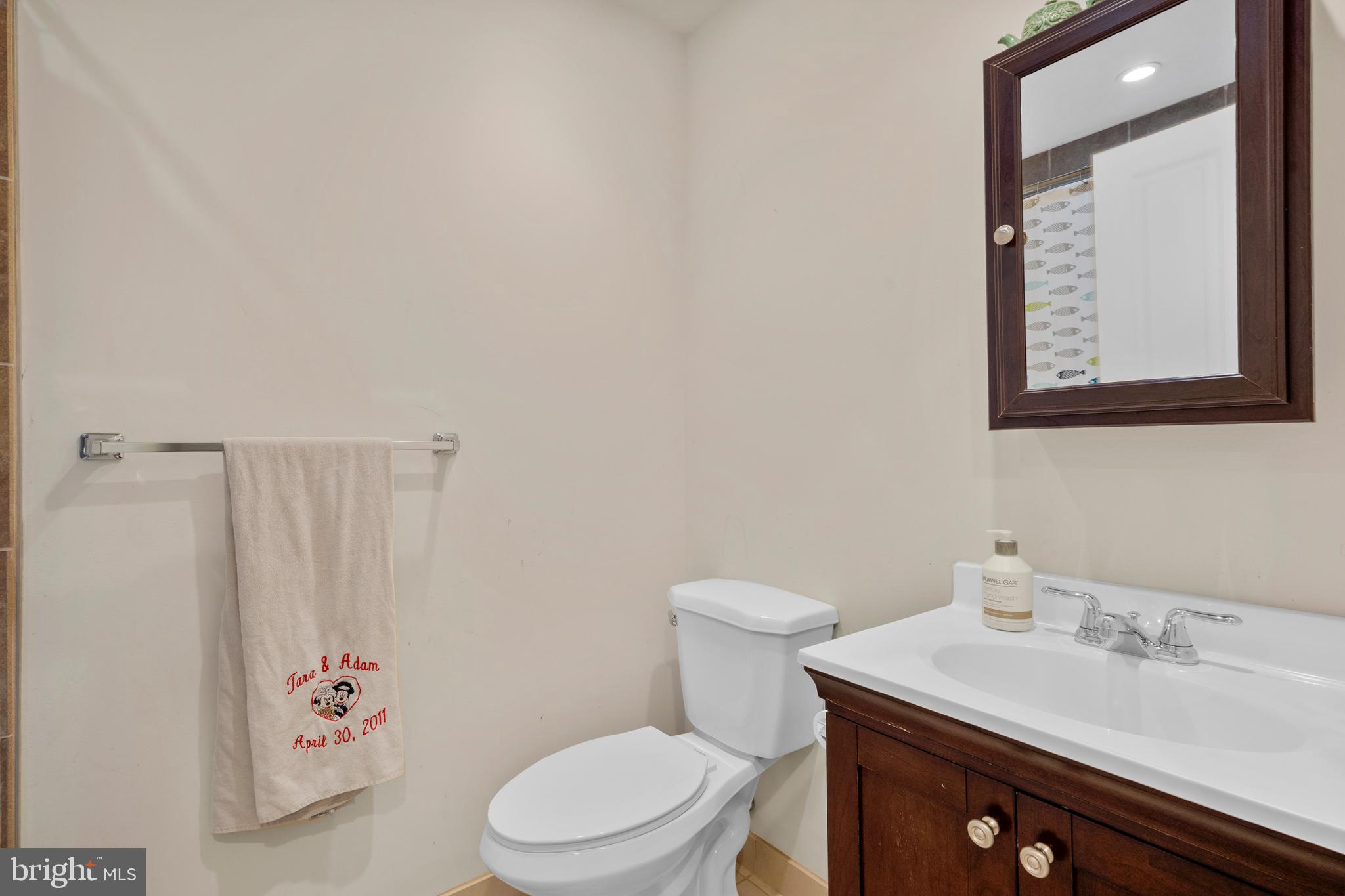 29 Concord Road Marlton, NJ 08053 - Photo 37 of 49 a bathroom with a sink a toilet and a mirror