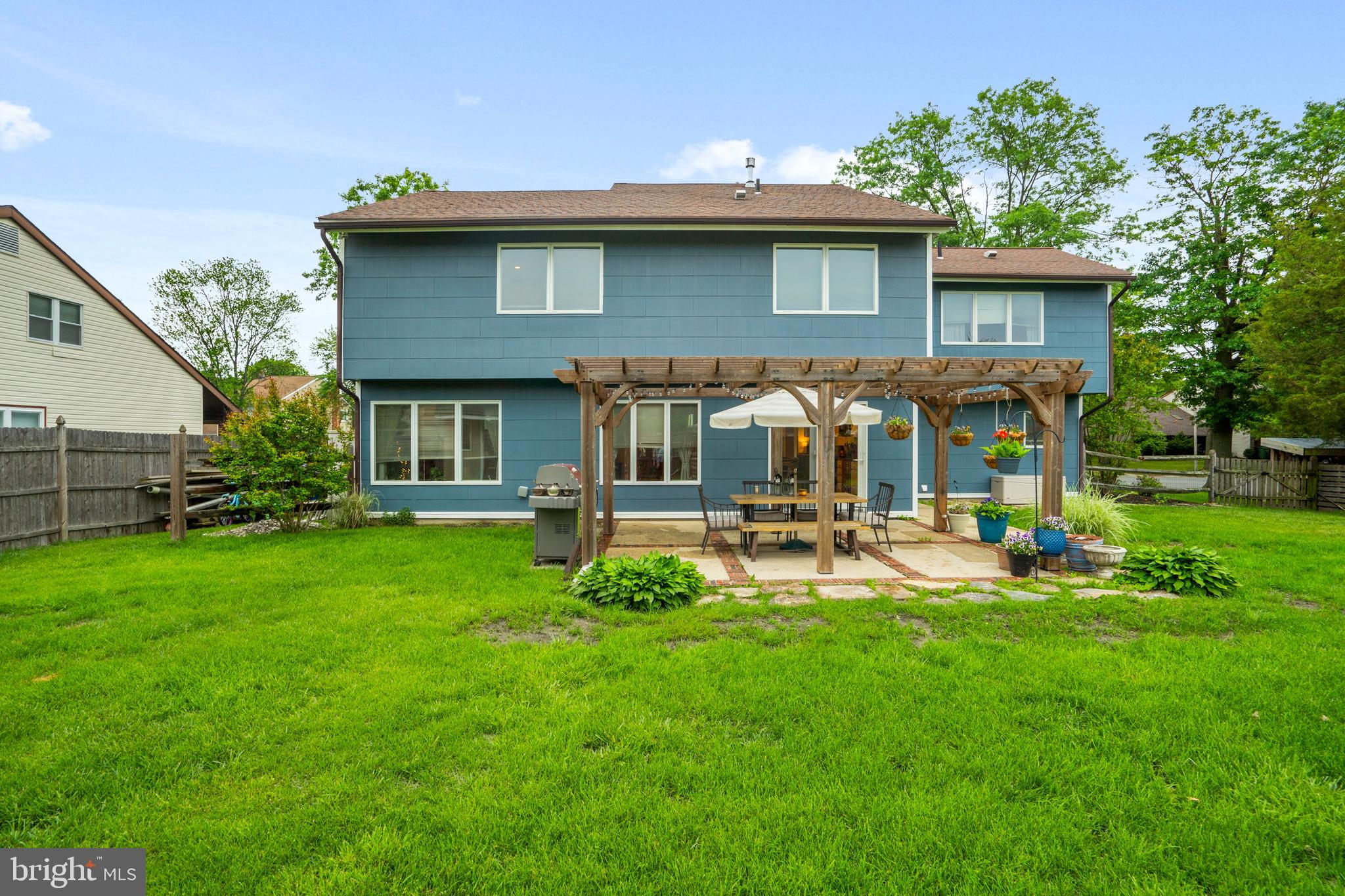 29 Concord Road Marlton, NJ 08053 - Photo 4 of 49 a view of a house with backyard and sitting area