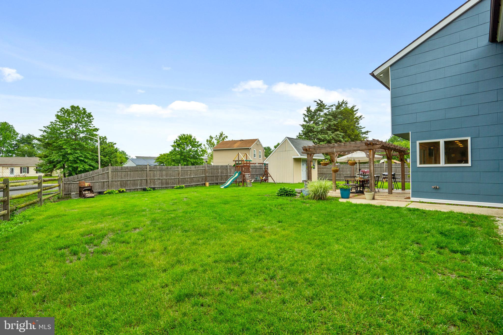 29 Concord Road Marlton, NJ 08053 - Photo 7 of 49 a view of a house with backyard and a garden