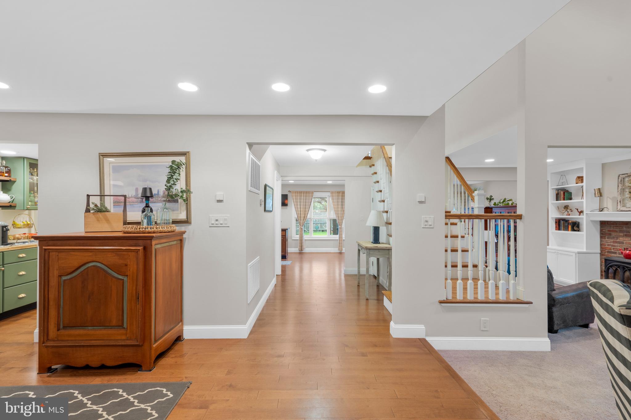 29 Concord Road Marlton, NJ 08053 - Photo 9 of 49 a view of a hallway with wooden floor and furniture