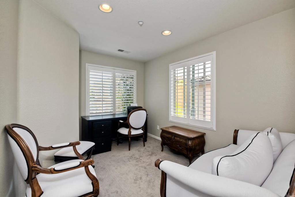 2256 Flatiron Way San Marcos, CA 92078 - Photo 16 of 22 a living room with furniture and a window