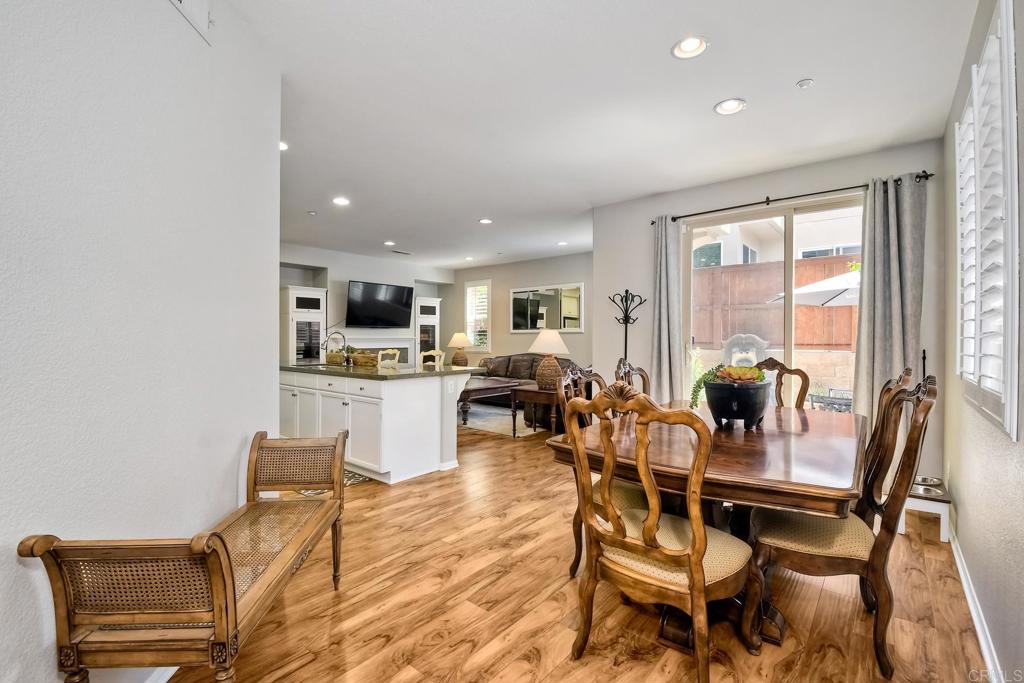 2256 Flatiron Way San Marcos, CA 92078 - Photo 2 of 22 a dining room with furniture and window