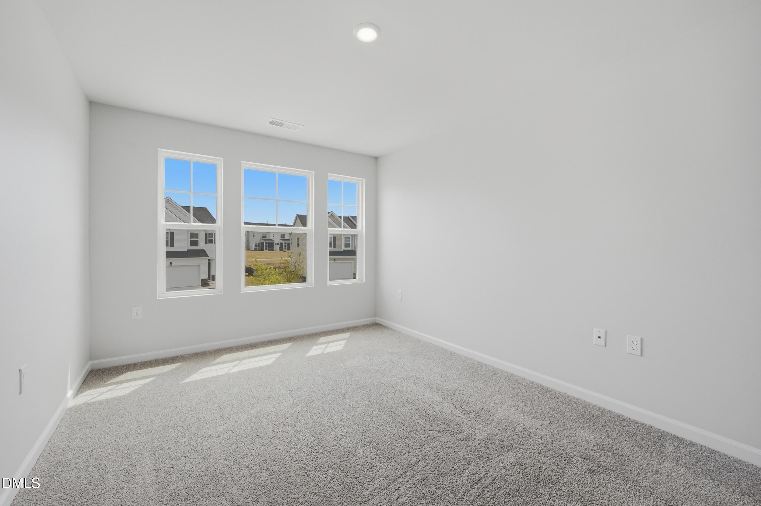 5011 Kota Street Raleigh, NC 27610 - Photo 22 of 42 a view of an empty room with a window