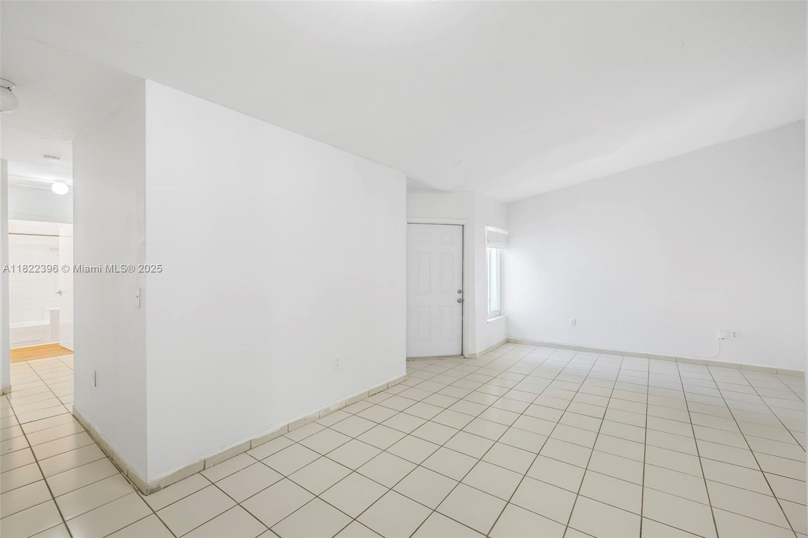 8421 Southwest 209th Street, Unit 8421 Cutler Bay, FL 33189 - Photo 12 of 16 a view of an empty room