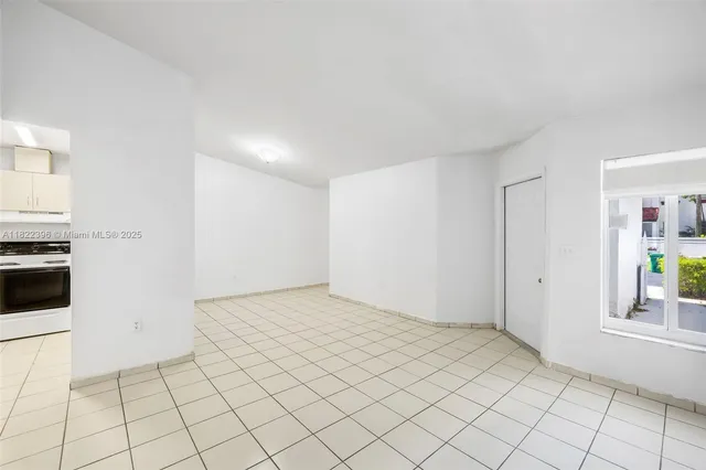 a view of an empty room and window