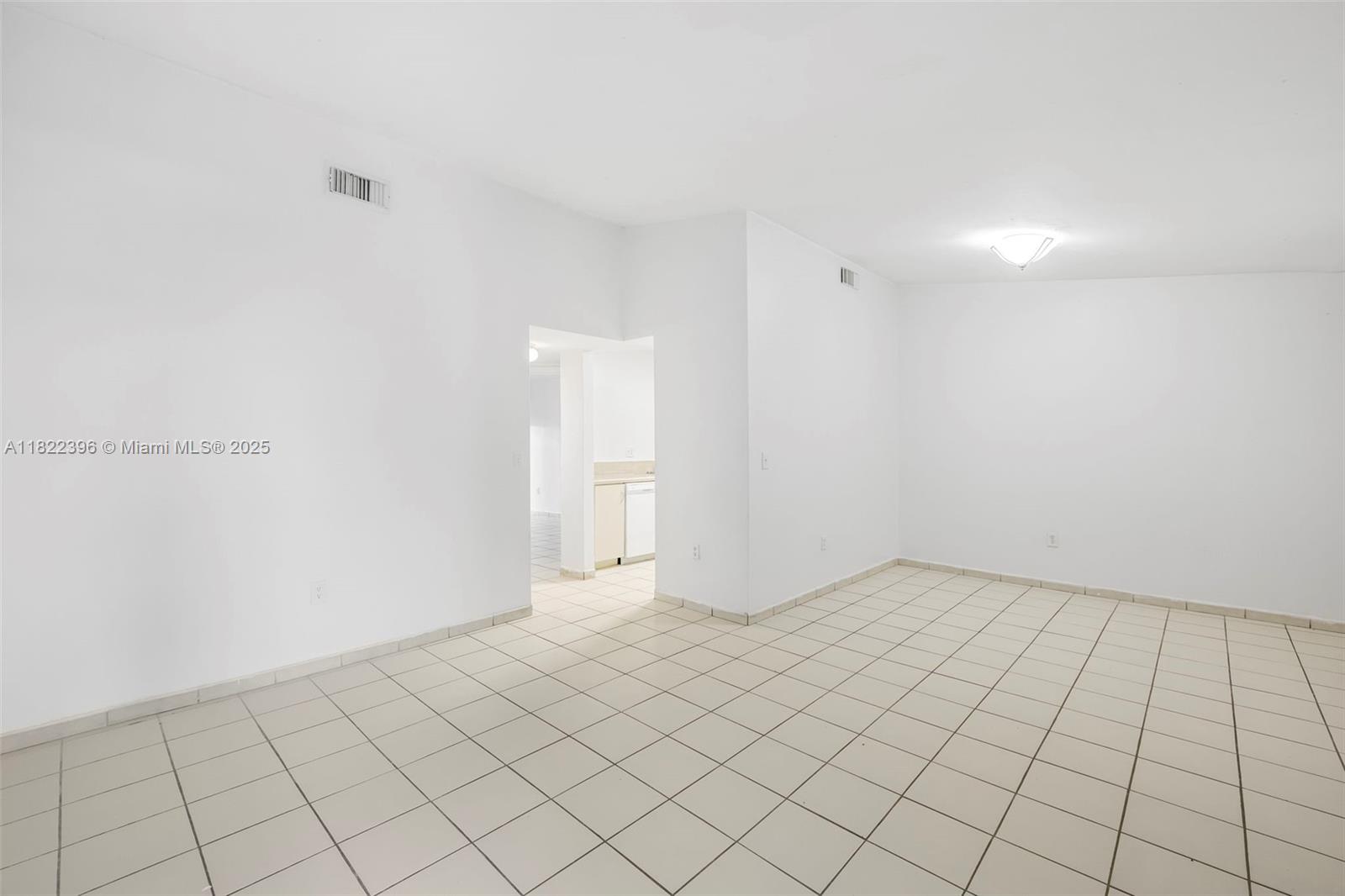 8421 Southwest 209th Street, Unit 8421 Cutler Bay, FL 33189 - Photo 15 of 16 a view of an empty room