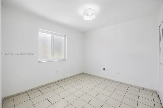 a bathroom with a sink toilet tub and shower