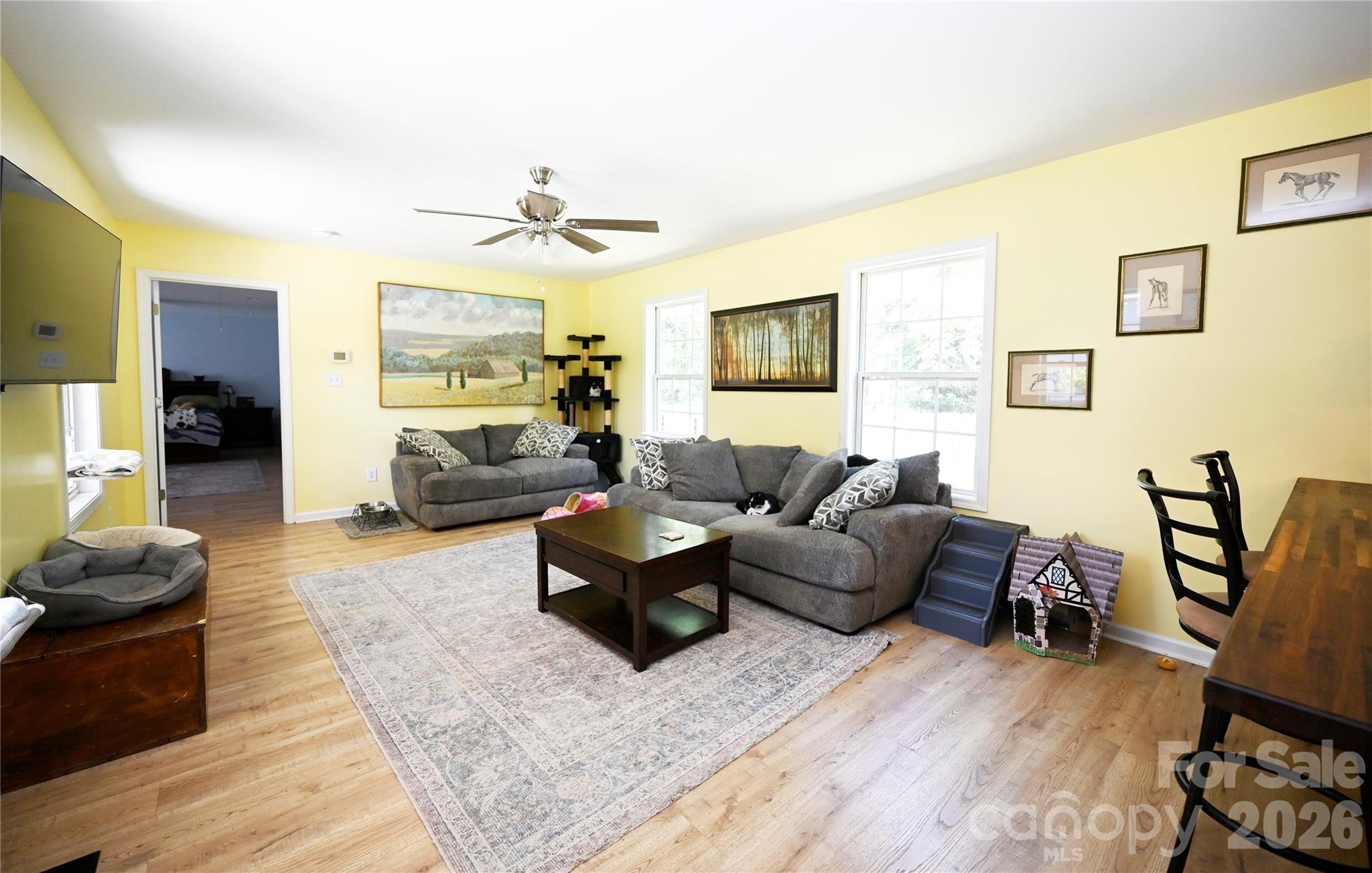 1845 State Rd S-46-149 Clover, SC 29710 - Photo 11 of 28 a living room with furniture or couch and a flat screen tv