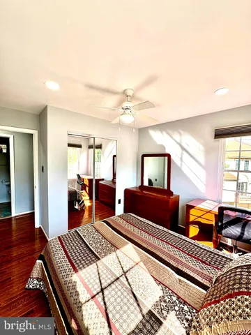 a bedroom with furniture and window