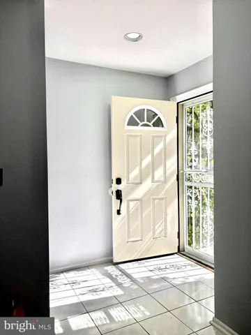 a view of an empty room and window