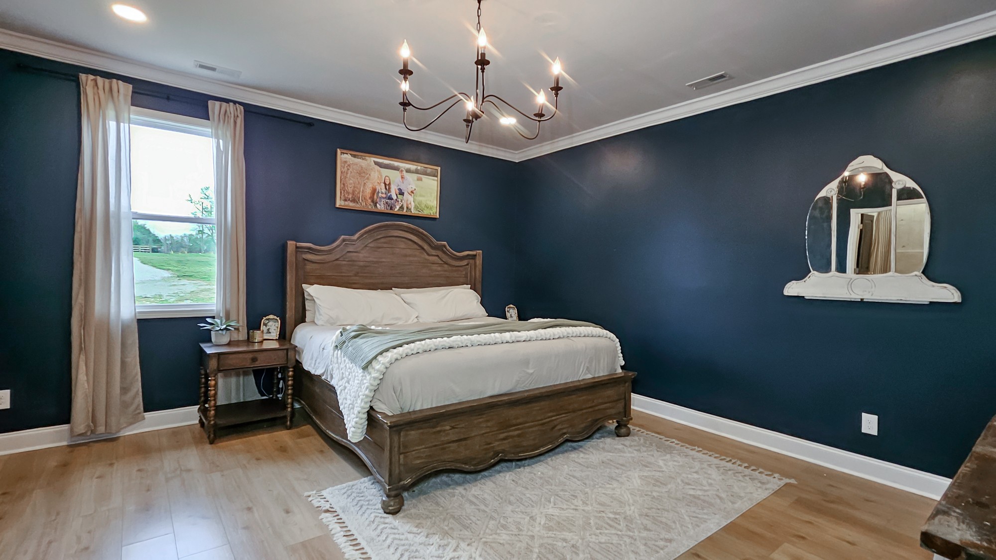 25872 Union Hill Road Ardmore, TN 38449 - Photo 17 of 28 a bedroom with a bed and a window