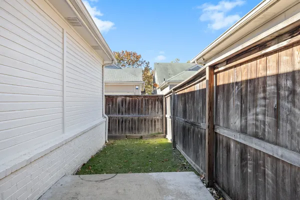 a porch with wooden fence