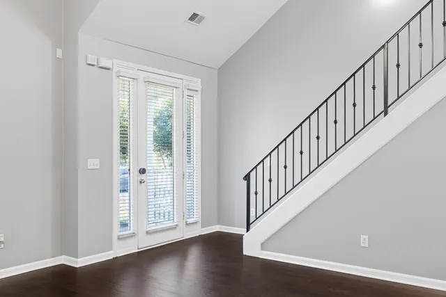 a view of entryway with wooden floor