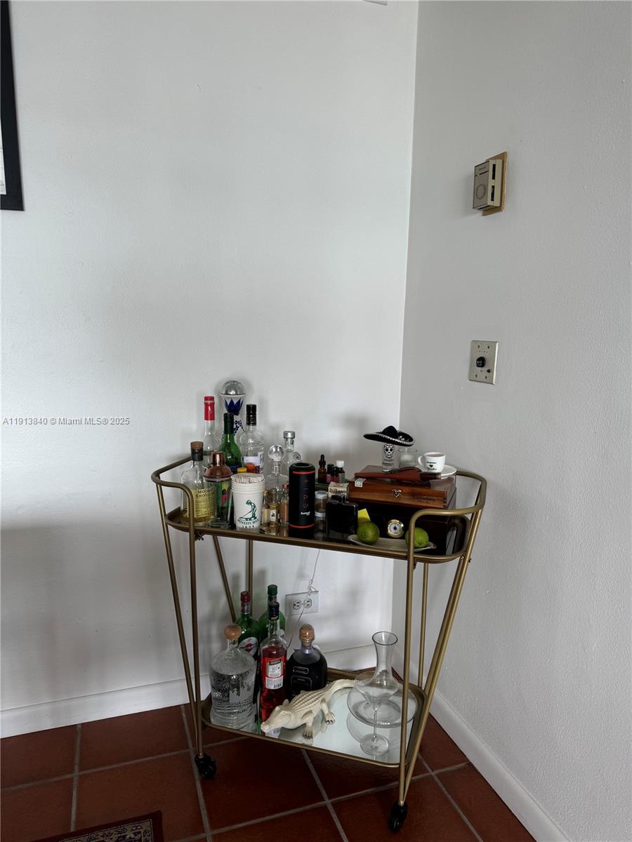 2451 Brickell Avenue, Unit 16U Miami, FL 33129 - Photo 14 of 17 a view of a workspace with furniture and clutter