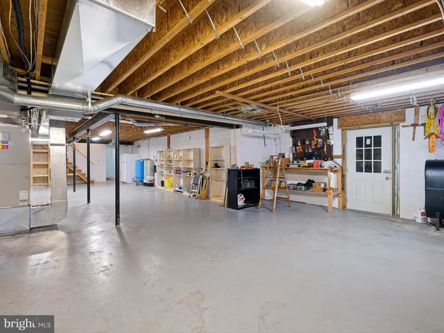 a patio with yard glass top table and chairs
