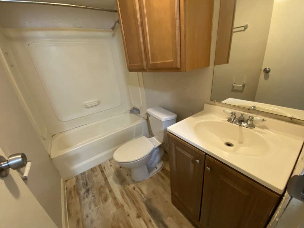 368 Pine Ridge Drive Cleveland, TX 77327 - Photo 11 of 27 a bathroom with a sink toilet and shower
