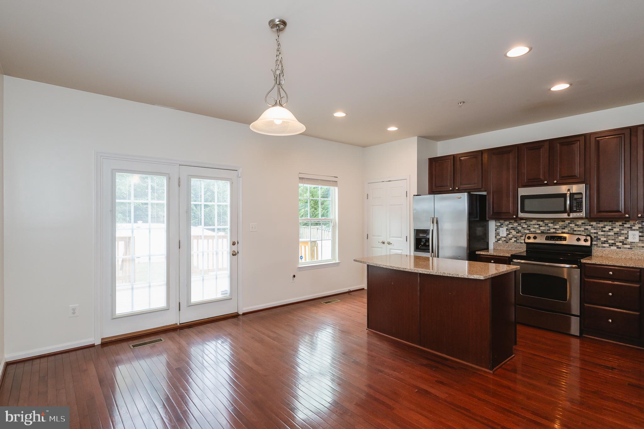 235 Staysail Drive Joppa, MD 21085 - Photo 13 of 38 Dining Area with French Doors to Deck