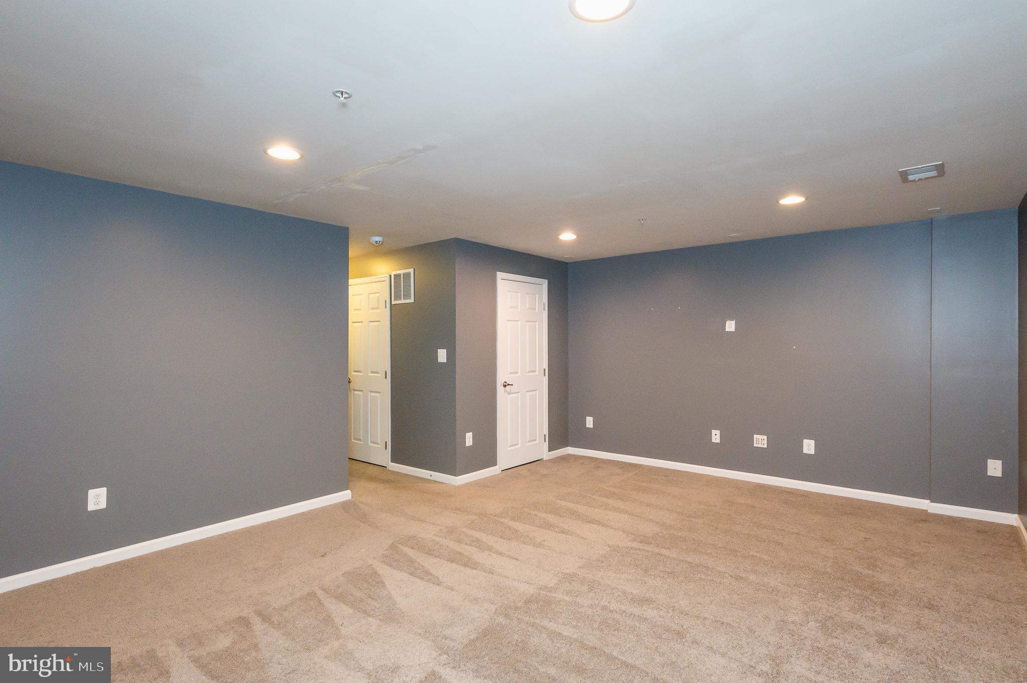 235 Staysail Drive Joppa, MD 21085 - Photo 32 of 38 Lower Level Family Room
