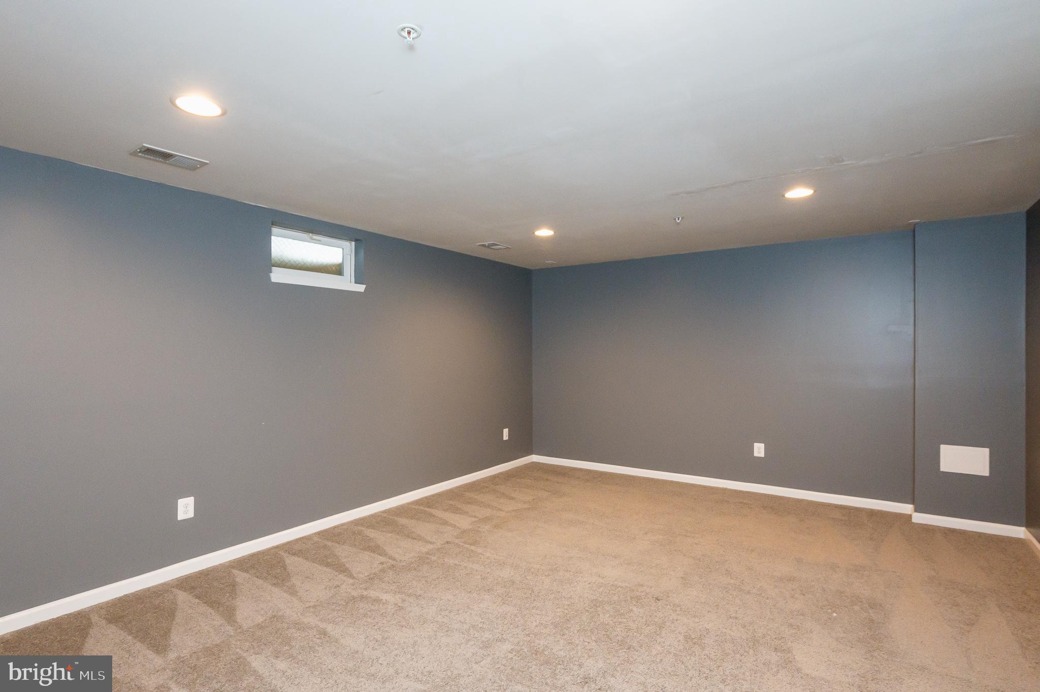 235 Staysail Drive Joppa, MD 21085 - Photo 33 of 38 Lower Level Family Room