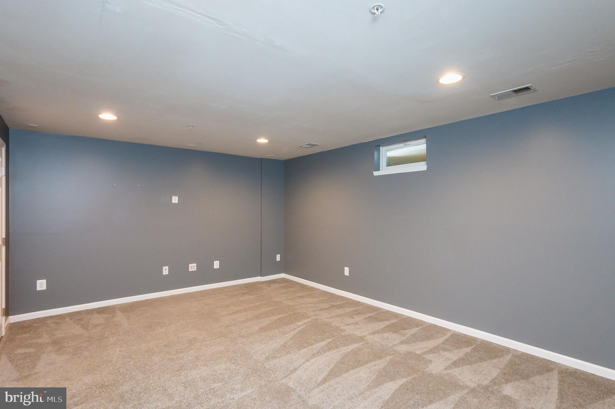 235 Staysail Drive Joppa, MD 21085 - Photo 34 of 38 Lower Level Family Room