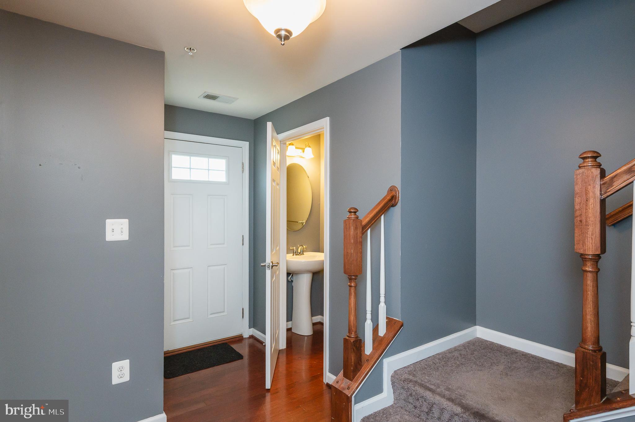 235 Staysail Drive Joppa, MD 21085 - Photo 4 of 38 Foyer with Half Bath