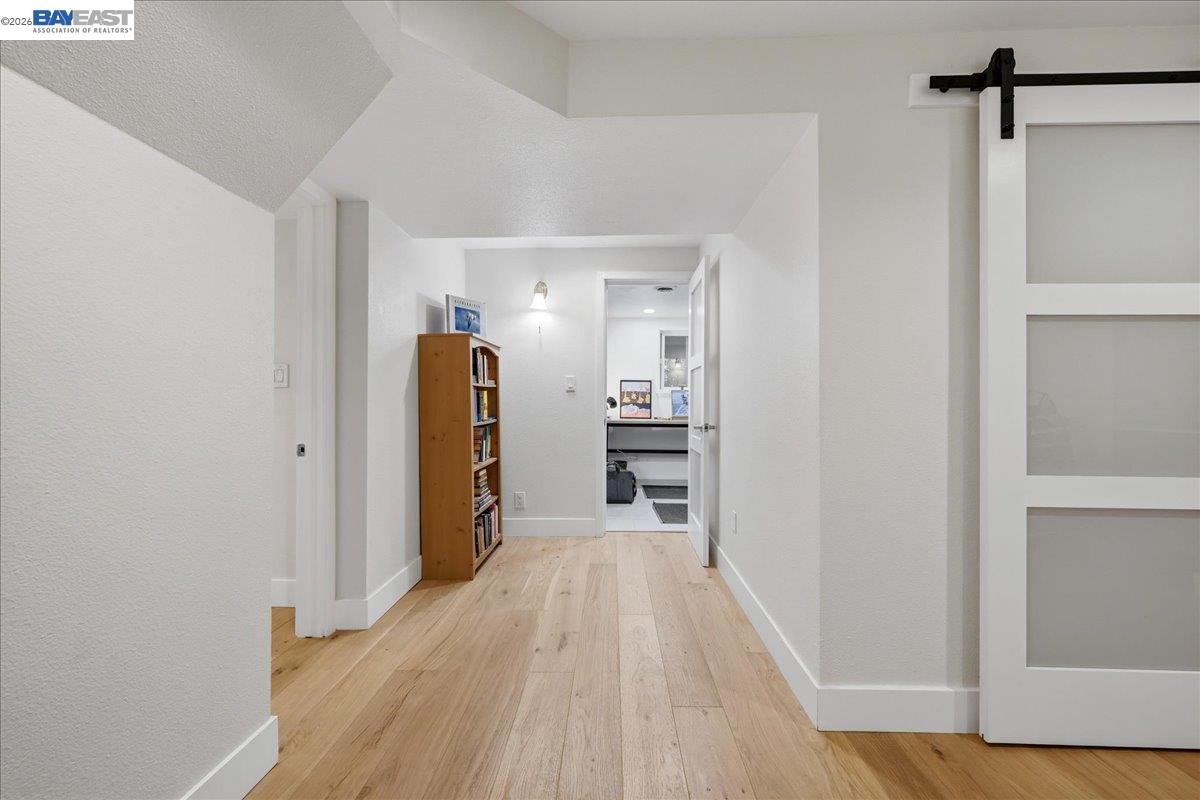 22111 Prospect Street Hayward, CA 94541 - Photo 38 of 70 a view of a hallway with wooden floor and closet