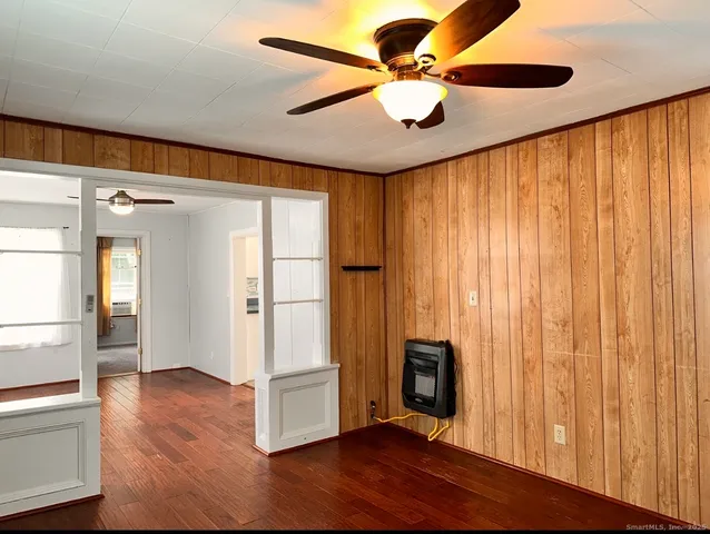 a view of entryway with wooden floor