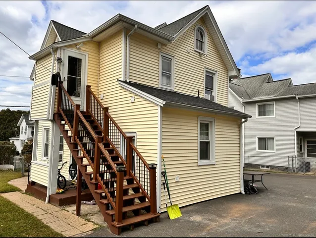 a view of a house with a garage