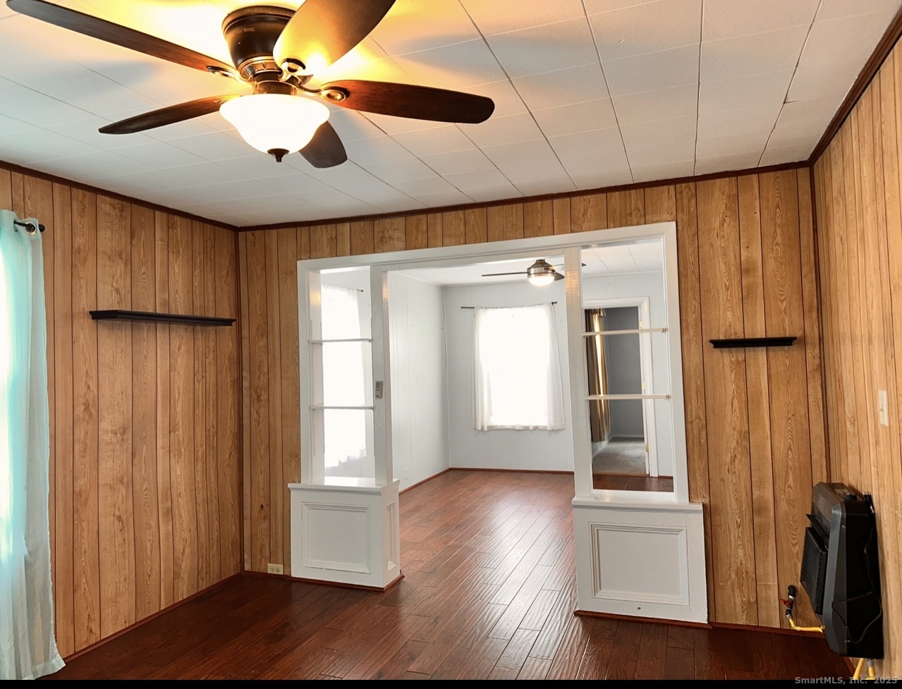 22 Hodge Avenue Ansonia, CT 06401 - Photo 21 of 22 a view of empty room with wooden floor