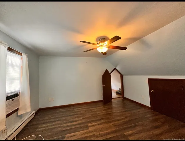 a view of a livingroom with a staircase