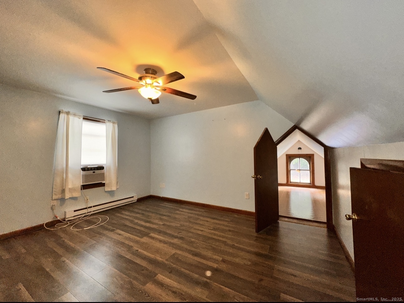 22 Hodge Avenue Ansonia, CT 06401 - Photo 8 of 22 a view of an empty room with window and wooden floor