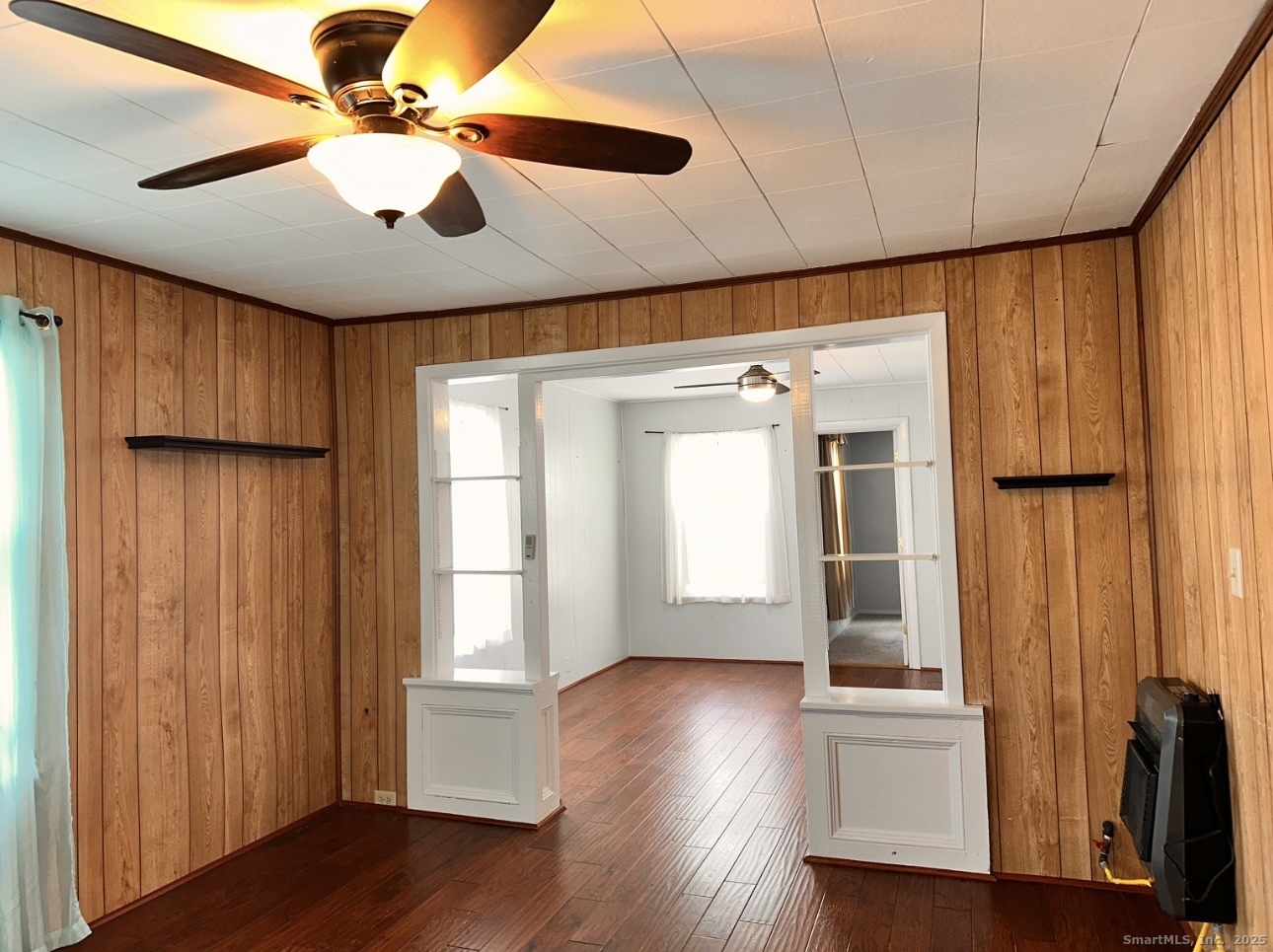 22 Hodge Avenue Ansonia, CT 06401 - Photo 10 of 22 a view of an empty room with wooden floor and a window