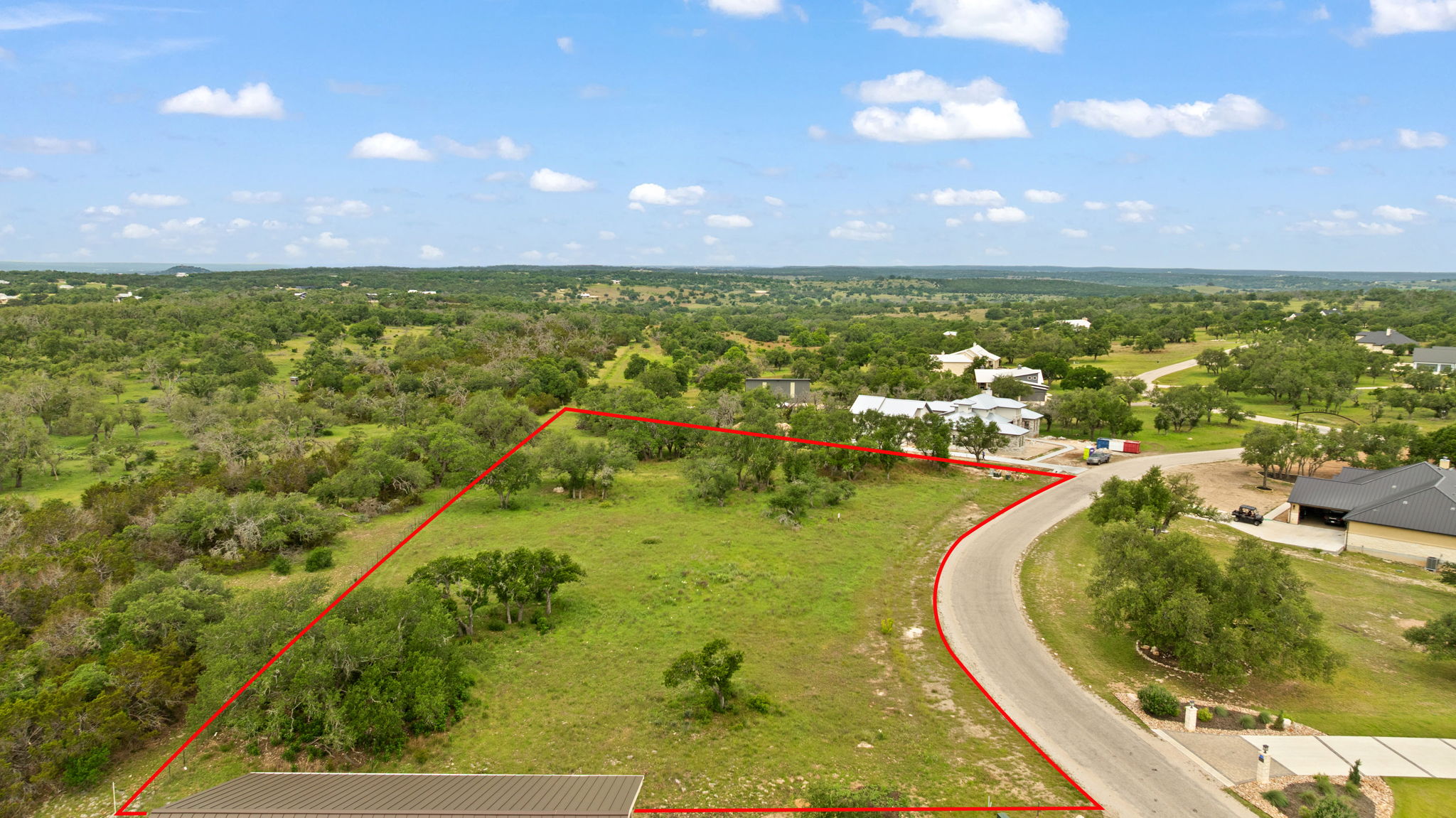 120 Trophy Oak Point Fredericksburg, TX 78624 - Photo 11 of 33 Aerial view of property's location featuring property parcel outlined and a heavily wooded area